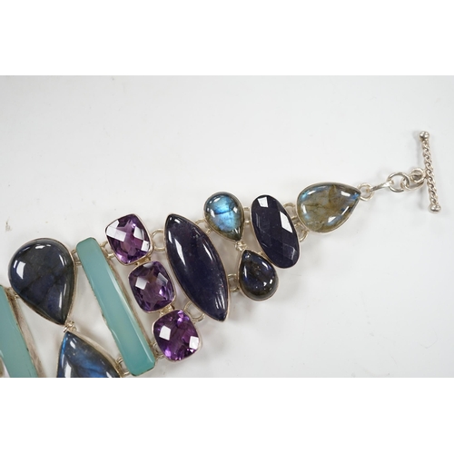 1931 - A white metal and multi gem set bracelet, including dyed agate, amethyst and labradorite, 21cm.... 