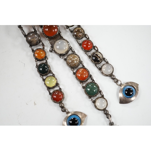 1932 - A white metal and cabochon multi gem set chatelaine, including jasper, carnelian and banded agate, 1... 