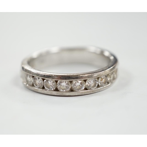 1937 - A modern Iliana 18ct white gold and nine stone channel set diamond half eternity ring, size R, gross... 