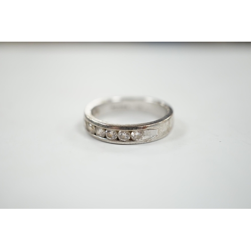 1937 - A modern Iliana 18ct white gold and nine stone channel set diamond half eternity ring, size R, gross... 