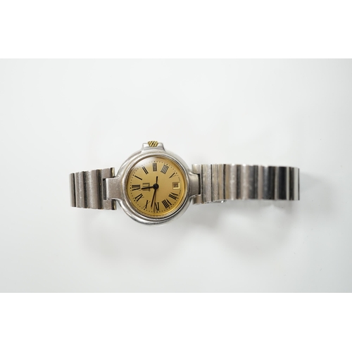 1954 - A lady's 1970's stainless steel Dunhill quartz wrist watch, with centre seconds and date aperture wi... 