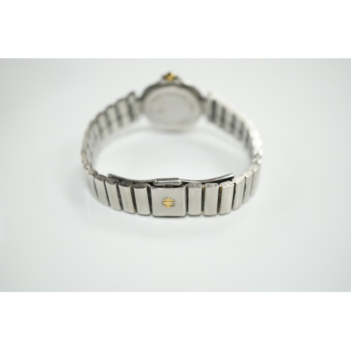 1954 - A lady's 1970's stainless steel Dunhill quartz wrist watch, with centre seconds and date aperture wi... 