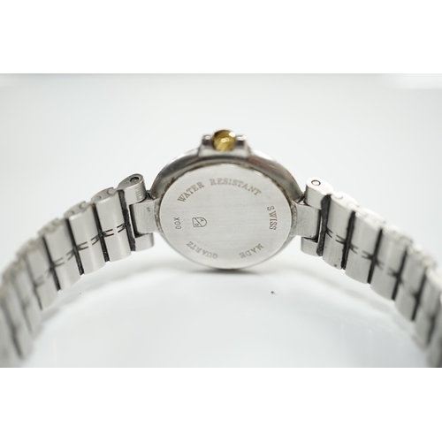 1954 - A lady's 1970's stainless steel Dunhill quartz wrist watch, with centre seconds and date aperture wi... 