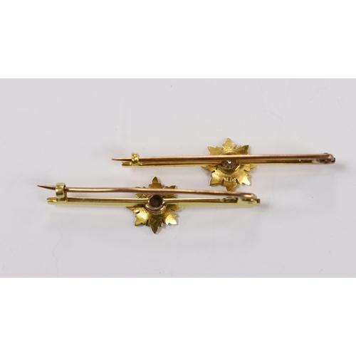 1966 - A pair of early 20th century yellow metal and single stone diamond set flower head bar brooches, 44m... 