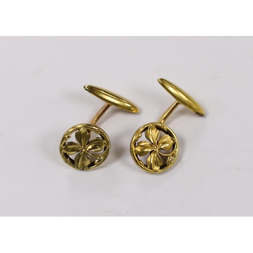 1977 - A pair of continental yellow metal overlaid circular cufflinks, of pierced foliate form, 14mm.... 