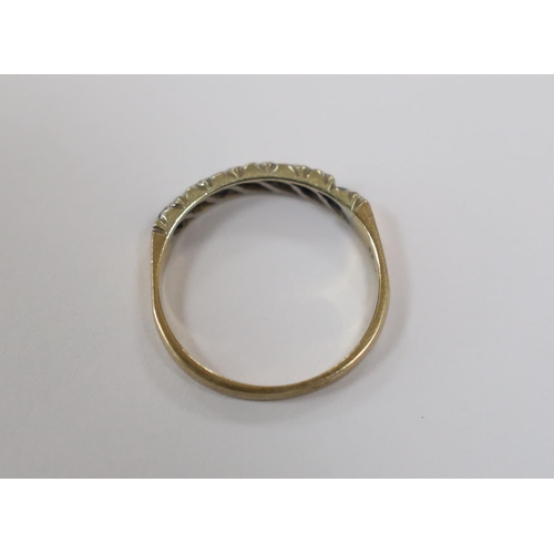 1980 - A modern 9ct gold, four stone sapphire and three stone diamond chip set half hoop ring, size N, gros... 