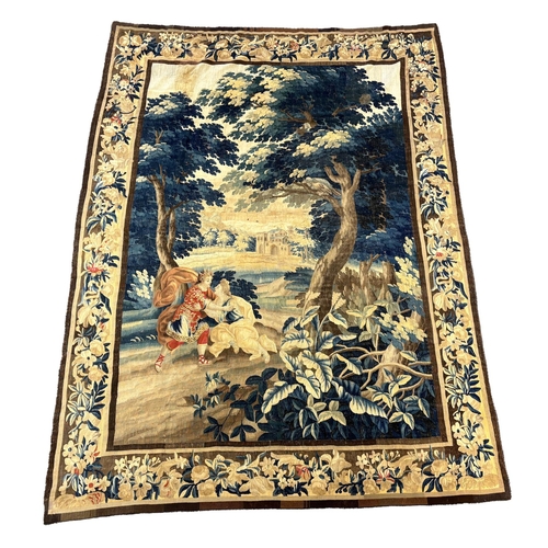 12 - A late 18th century Brussels Verdue figurative tapestry, depicting Royal lovers in a landscape with ... 