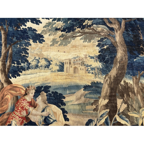 12 - A late 18th century Brussels Verdue figurative tapestry, depicting Royal lovers in a landscape with ... 