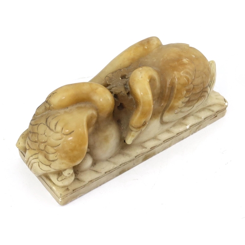 24 - § § William McMillan A.R.A. (1887-1997), a carved alabaster group 'Swans', 43cm wide, 18cm high... 