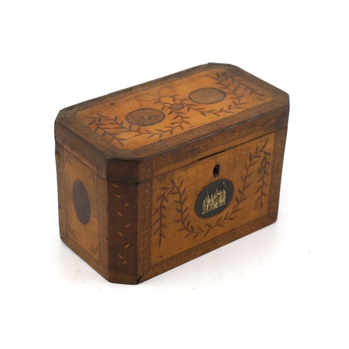 28 - A George III Sheraton style marquetry inlaid satinwood tea caddy of octagonal form with foliate swag... 