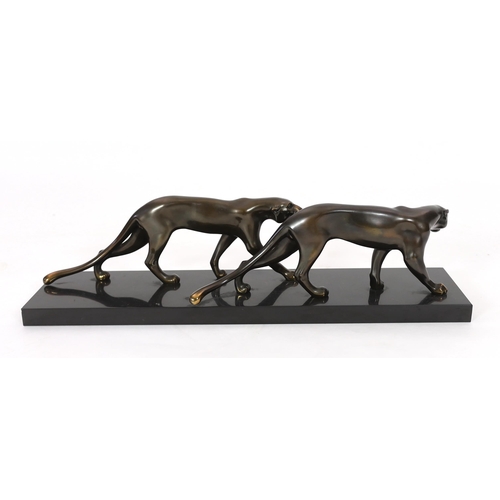 42 - Marty Font, a French Art Deco bronzed and black marble group of two prowling panthers, signed on the... 