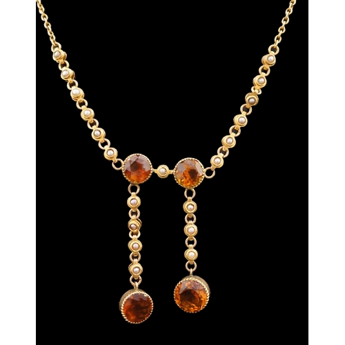 452 - An Edwardian 15ct gold, seed pearl and citrine graduated double drop necklace, set with four round c... 