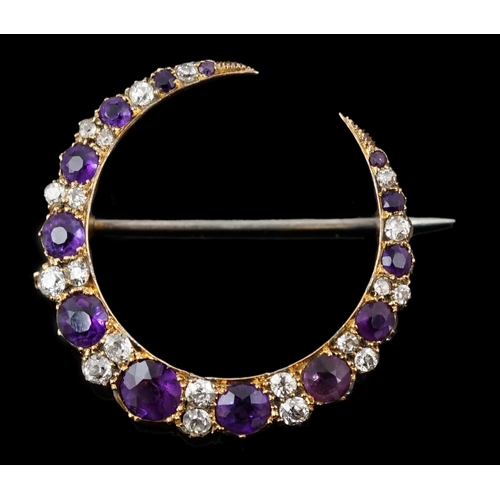 453 - A late Victorian gold, graduated amethyst and diamond cluster set crescent brooch, 33mm, with safety... 