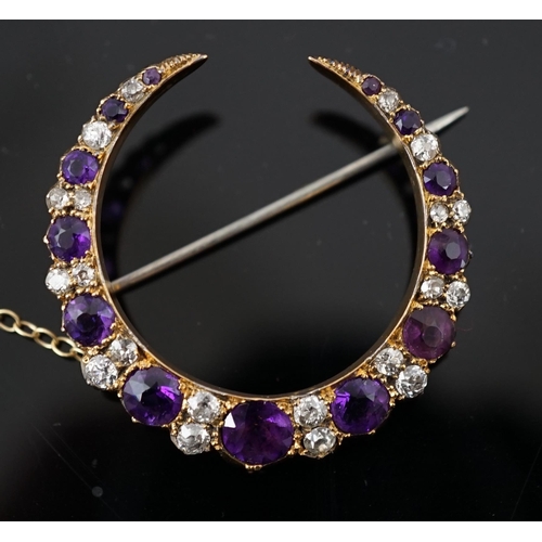 453 - A late Victorian gold, graduated amethyst and diamond cluster set crescent brooch, 33mm, with safety... 