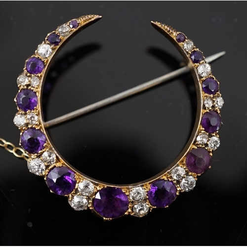 453 - A late Victorian gold, graduated amethyst and diamond cluster set crescent brooch, 33mm, with safety... 