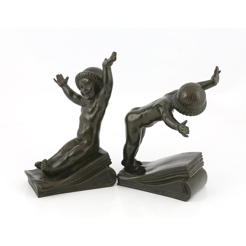 46 - Claude (Claude-Marie Devenet 1851-1931), a pair of French Art Deco bronze bookends, Marcel Guillemar... 