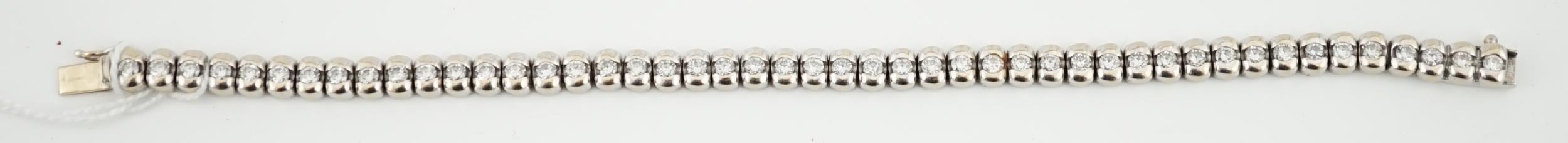 A Modern 18ct White Gold And Collet Set Forty Seven Stone Round 