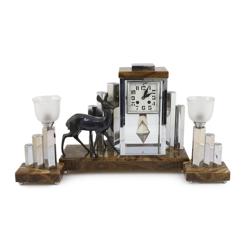 50 - Attributed to Michel Decoux, a French Art Deco chrome and marble clock garniture, the central clock ... 