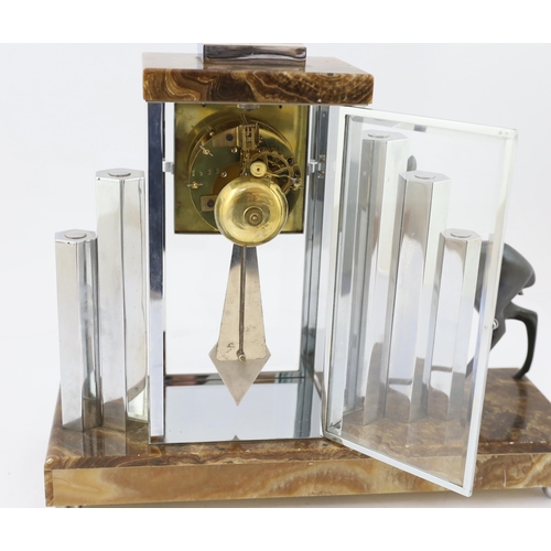 50 - Attributed to Michel Decoux, a French Art Deco chrome and marble clock garniture, the central clock ... 