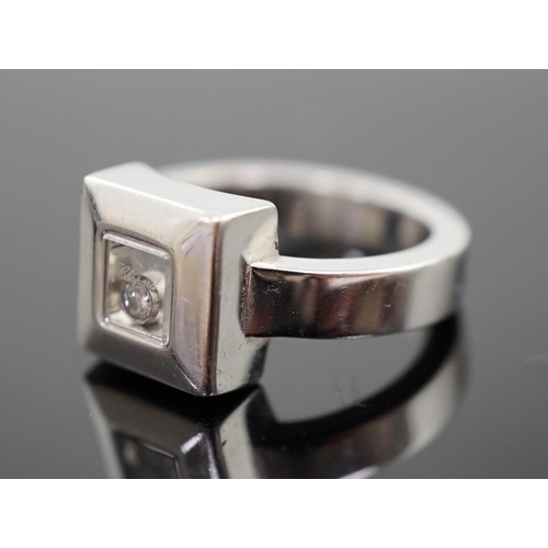 504 - A modern Chopard 18ct white gold 'Happy Floating' diamond ring, makers mark GA, size K, gross weight... 