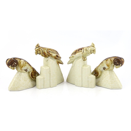 53 - Camille Tharaud (French, b.1878), two pairs of Art Deco porcelain bookends, c.1925, modelled as a pa... 