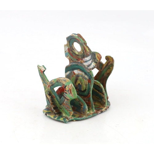 56 - § Angus Suttie (1946-1993), a multi coloured glazed pottery toast rack, with five divisions, the cen... 