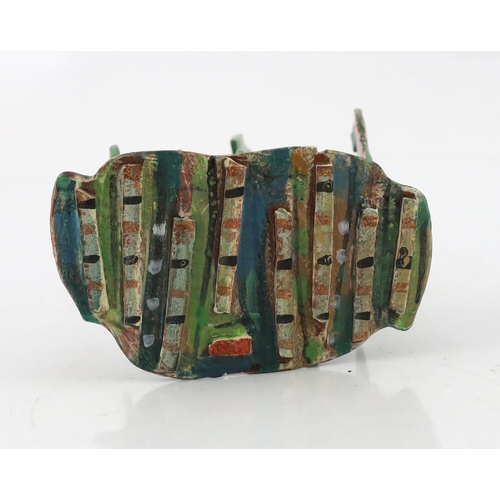 56 - § Angus Suttie (1946-1993), a multi coloured glazed pottery toast rack, with five divisions, the cen... 