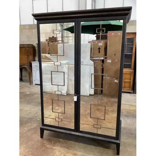 2017 - A mirrored armoire by Middleton  Bespoke Joinery, width 122cm, depth 63cm, height 181cm