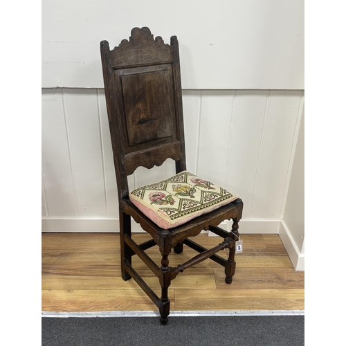 2140 - A William III oak backstool, late 17th century, width 44cm, depth 38cm, height 140cm