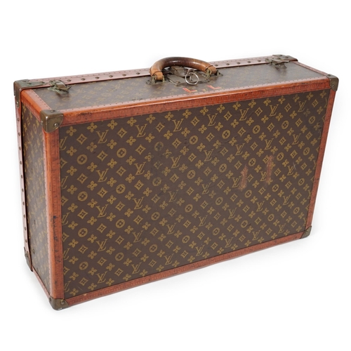 2275 - A vintage Louis Vuitton monogram canvas suitcase, no. 780445, 71cm x 44cm x 22cm