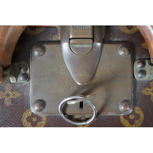 2275 - A vintage Louis Vuitton monogram canvas suitcase, no. 780445, 71cm x 44cm x 22cm