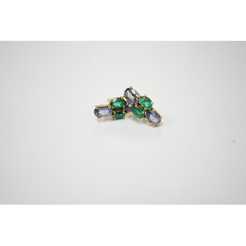 2990 - A modern pair of 18ct gold, two stone emerald and two stone sapphire set ear studs, 15mm by 7mm, gro... 