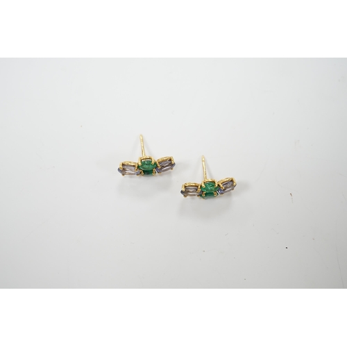 2990 - A modern pair of 18ct gold, two stone emerald and two stone sapphire set ear studs, 15mm by 7mm, gro... 