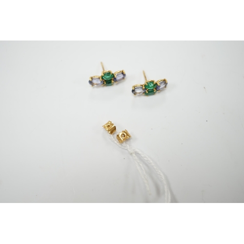 2990 - A modern pair of 18ct gold, two stone emerald and two stone sapphire set ear studs, 15mm by 7mm, gro... 