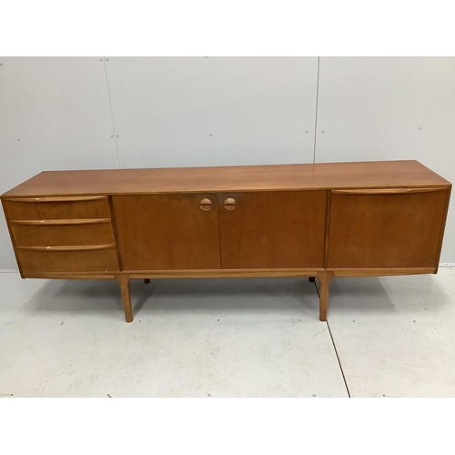 1033 - McIntosh of Kirkcaldy, a mid century teak dining suite comprising sideboard, width 213cm, depth 47cm... 