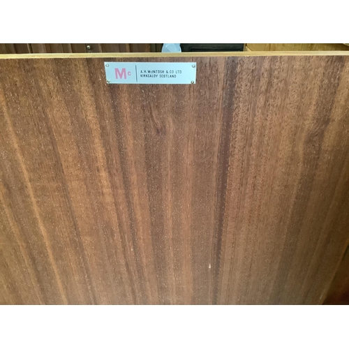 1033 - McIntosh of Kirkcaldy, a mid century teak dining suite comprising sideboard, width 213cm, depth 47cm... 