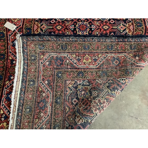 1086 - A North West Persian blue ground runner, 450 x 110cm