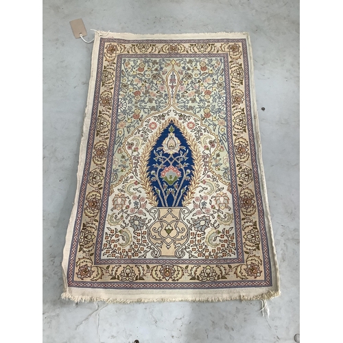 1108 - A North West Persian ivory ground silk prayer mat, 66 x 44cm