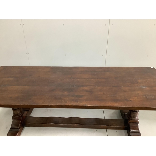 1109 - A 17th century style rectangular oak refectory dining table, width 228cm, depth 90cm, height 76cm... 