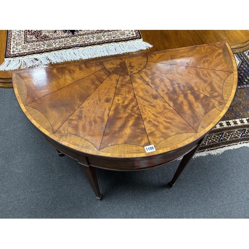 1186 - A George III satinwood D shape folding card table, width 92cm, depth 46cm, height 77cm