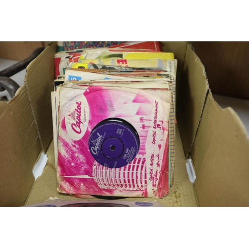 1255 - A collection of 45rpm 7 inch singles, artist include Elvis Presley, the Beatles, Creedence Clearwate... 