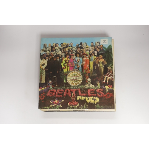 1274 - Fourteen The Beatles and related LP record albums including; Sergeant Pepper (with inserts), the Whi... 