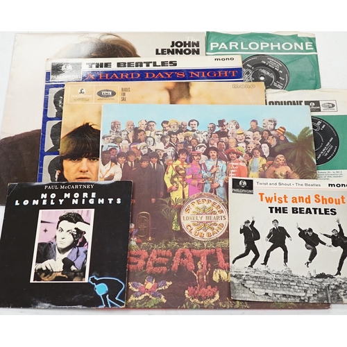 1275 - Four Beatles related LPs and four singles; Sgt Pepper, Beatles For Sale, A Hard Days Night, the John... 