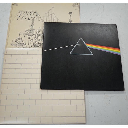 1278 - Three Pink Floyd LP record albums; Dark Side of the Moon, on Harvest SHVL 804, with both posters and... 