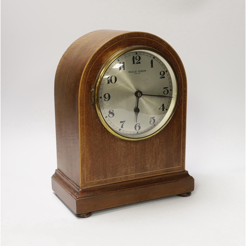 1400 - A mahogany Bulle-clock electric mantel timepiece, 30cm