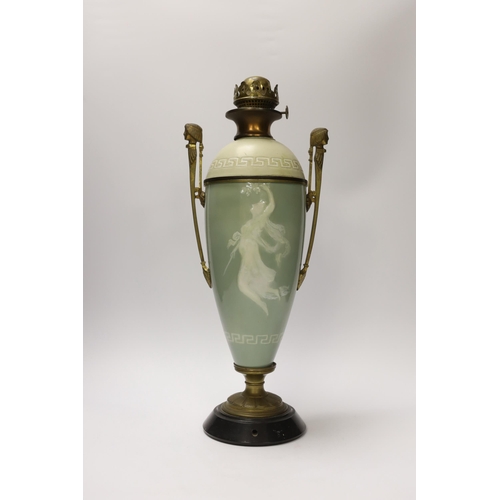 1402 - A late 19th century pate sur pate and gilt metal oil lamp with twin handles (restoration), 44cm... 