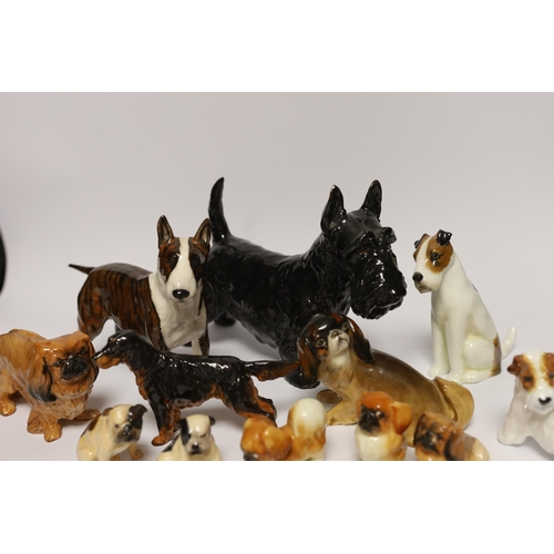 1403 - Fourteen Royal Doulton figures of dogs including Alborne Arthur