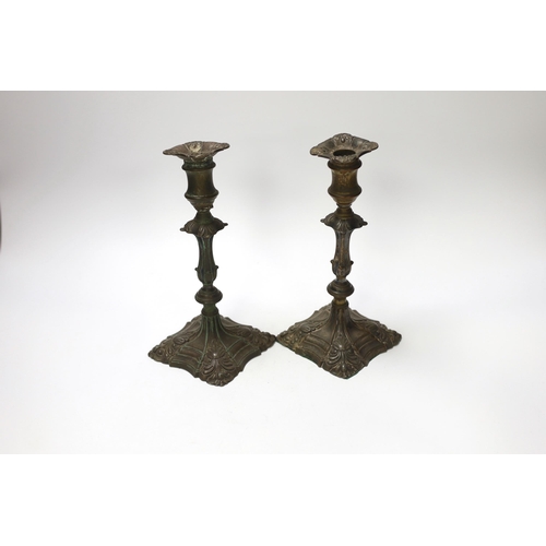 1406 - A pair of  late 18th century Old Sheffield plate candlesticks, 24cm high