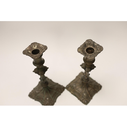 1406 - A pair of  late 18th century Old Sheffield plate candlesticks, 24cm high