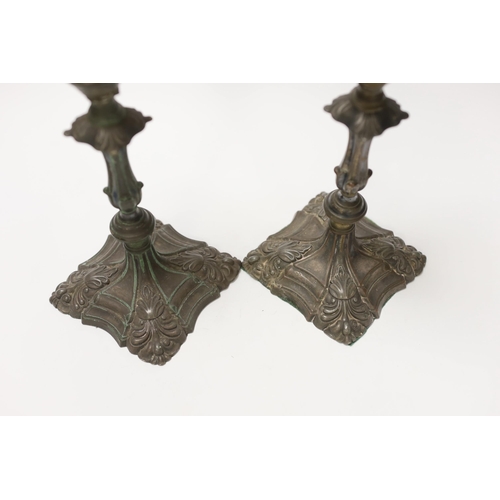 1406 - A pair of  late 18th century Old Sheffield plate candlesticks, 24cm high